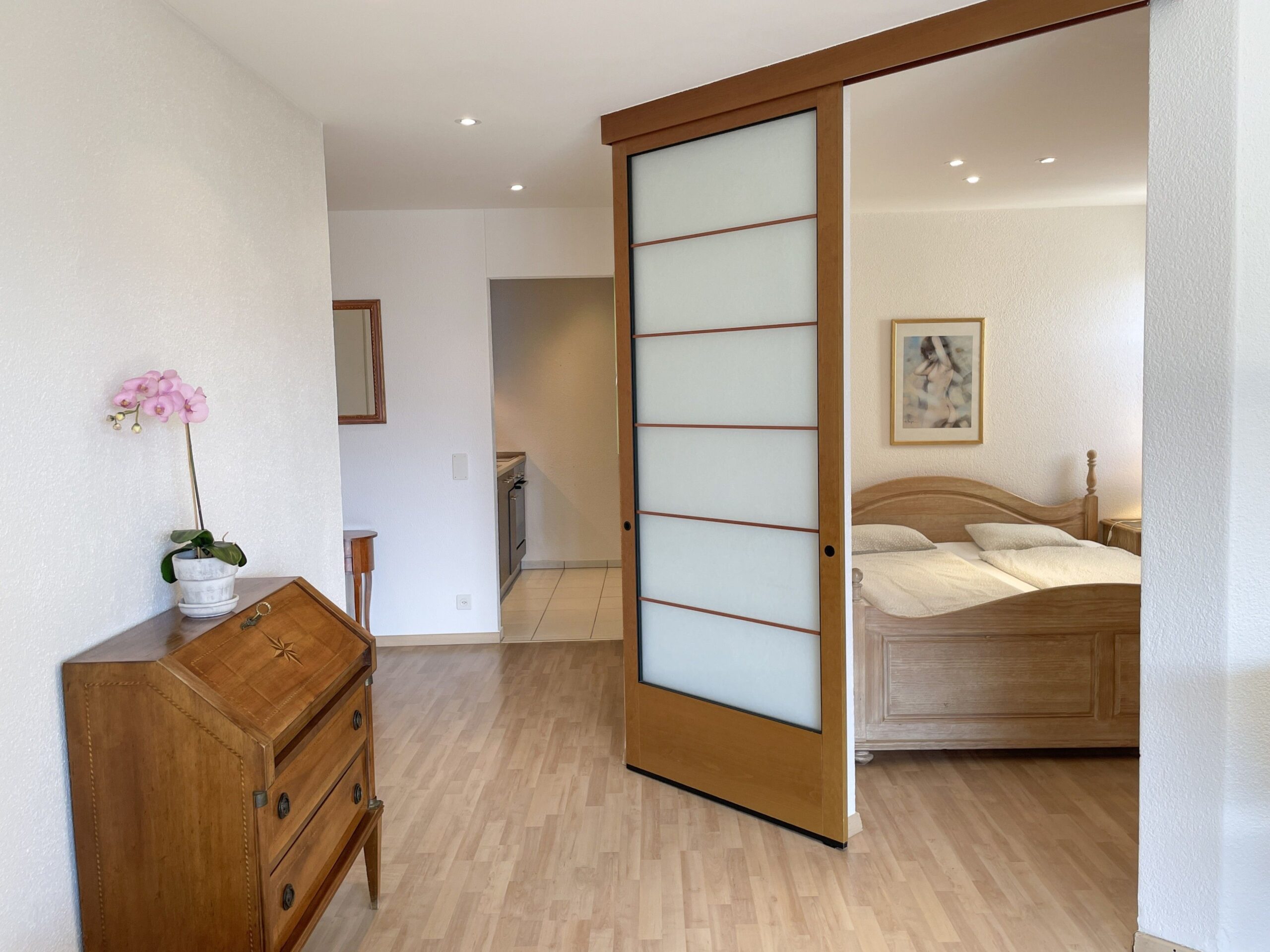 Schlafzimmer einer Ferienwohnung am Lago Maggiore