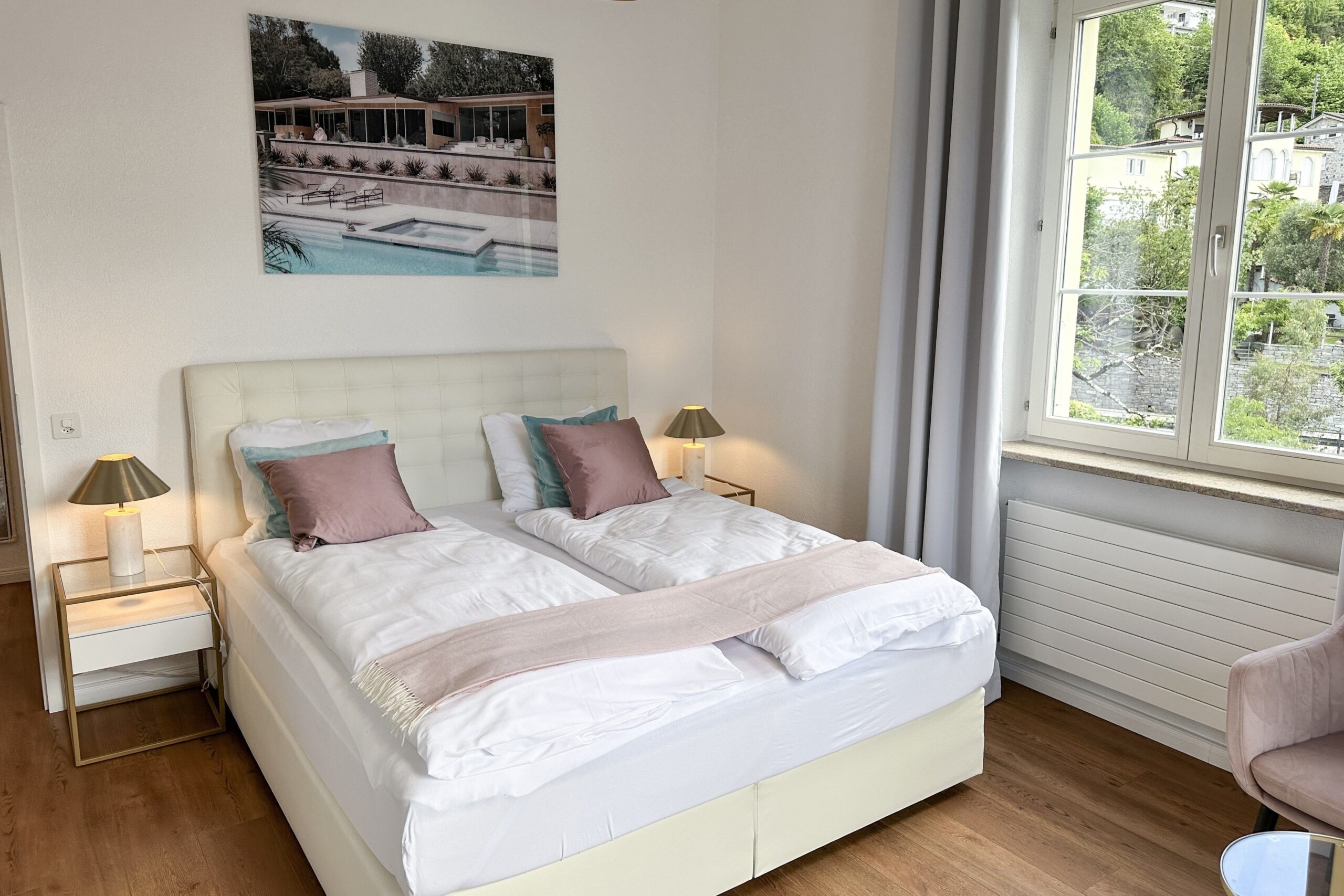 Schlafzimmer einer Ferienwohnung am Lago Maggiore